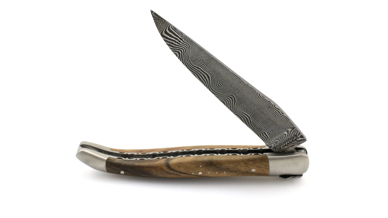 IMG_7134r7Kf4O3D64KE8 Laguiole en Aubrac  DSC® Carbon Damast Walnussholz guillochierte Platine 12 cm