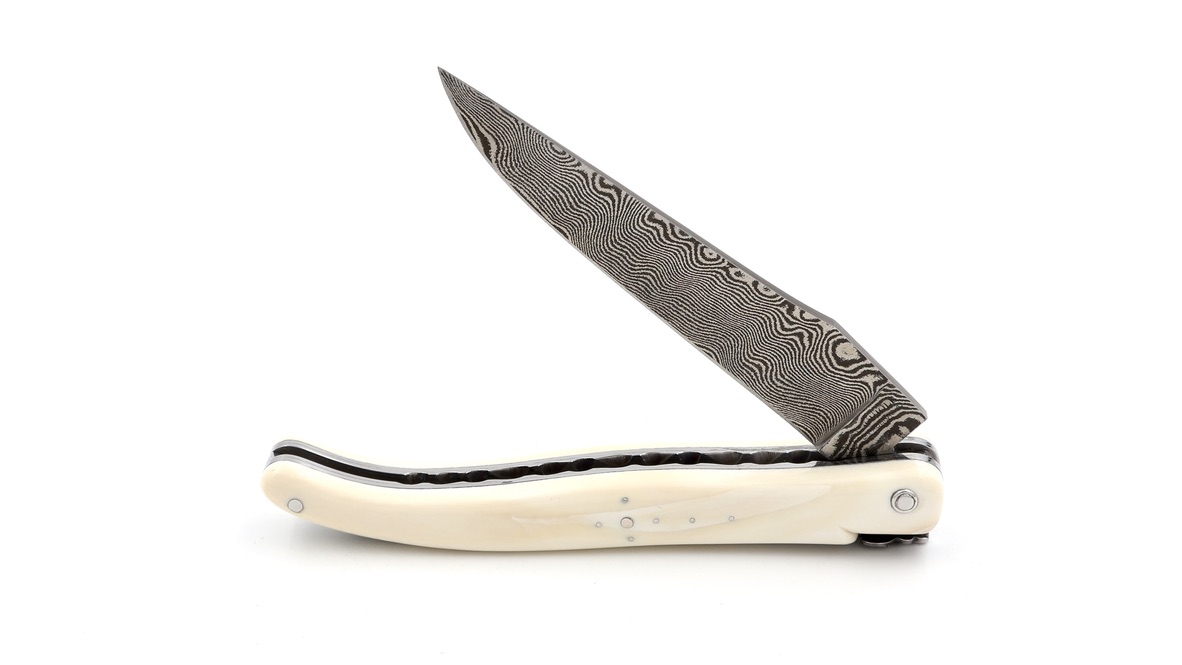 Laguiole en Aubrac double plates knife DSC® carbon damascus warthog-ivory full handle 12 cm