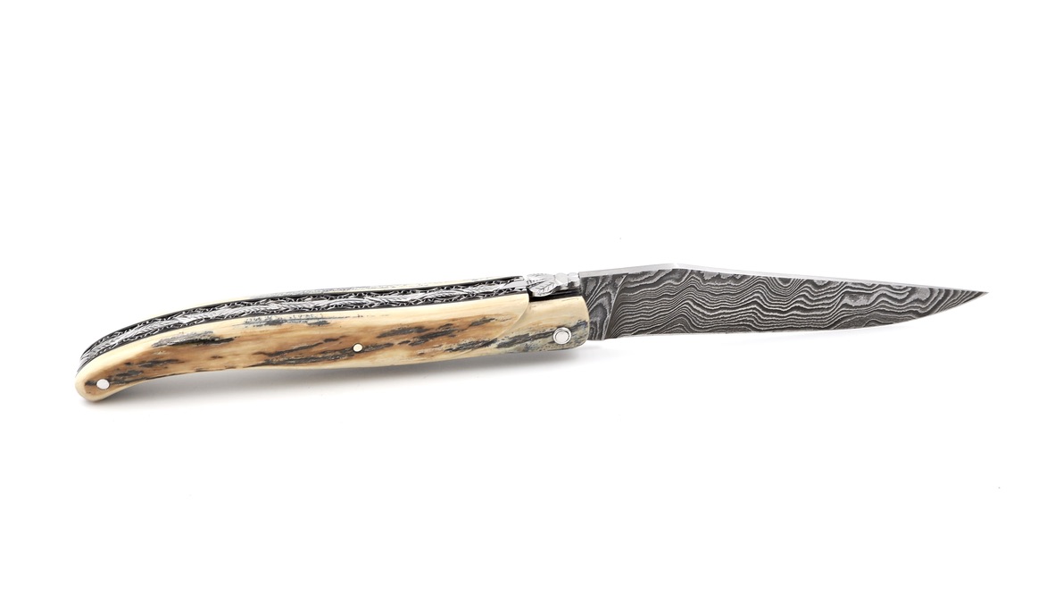Laguiole en Aubrac double plates knife damascus blade,  full handle Mammoth ivory crust 12 cm