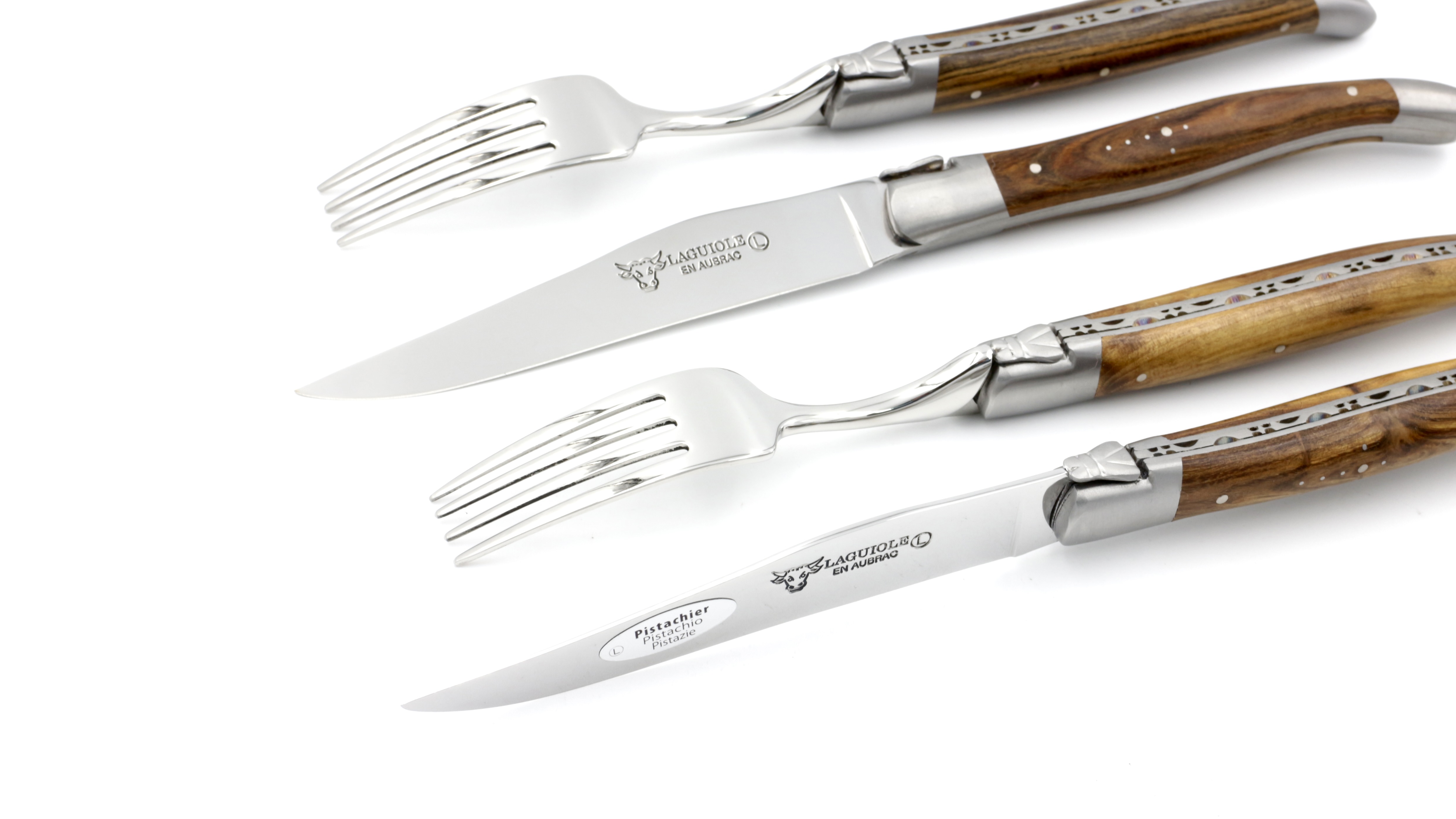 45028D0E-5F81-48E0-9CA0-E66A553A6693_1_201_a Laguiole en Aubrac – 4-teiliges Besteckset aus Pistazienholz (2 Messer, 2 Gabeln)