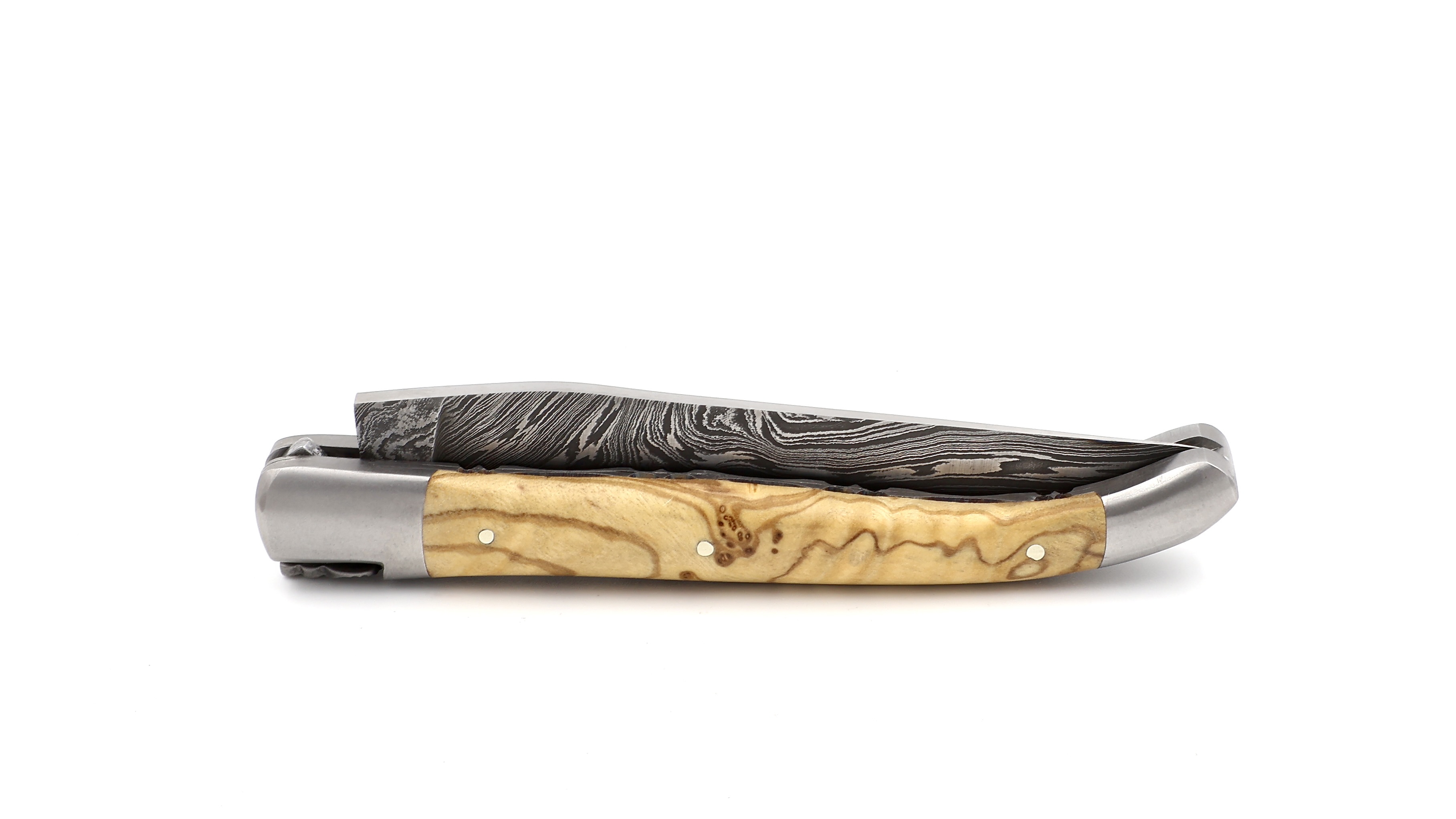 Laguiole en Aubrac double plate knife explosiondamascus olive wood 12 cm