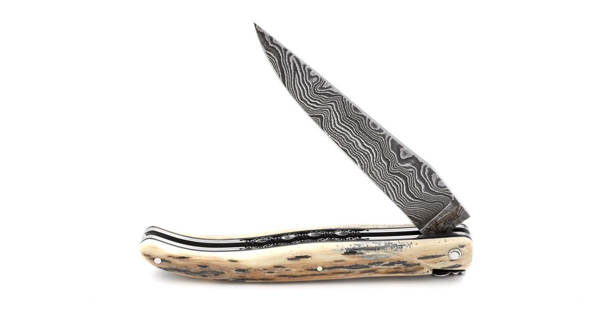 Laguiole en Aubrac double plates knife damascus blade,  full handle Mammoth ivory crust 12 cm