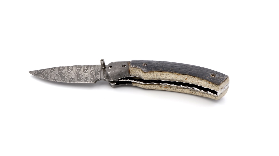 Olivier Moretti Linerlock Taschenmesser Mammutknochen Damastklinge Olivier Moretti Linerlock Taschenmesser Mammutknochen Damastklinge