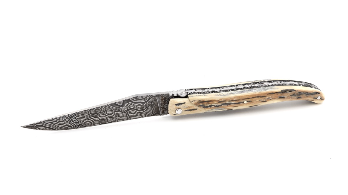 Laguiole en Aubrac double plates knife damascus blade,  full handle Mammoth ivory crust 12 cm